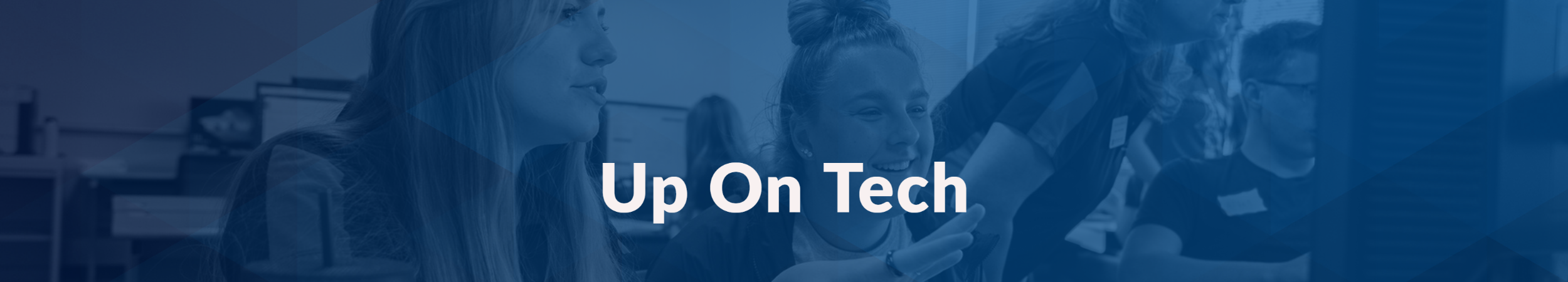 UpOnTech banner with students at a computer